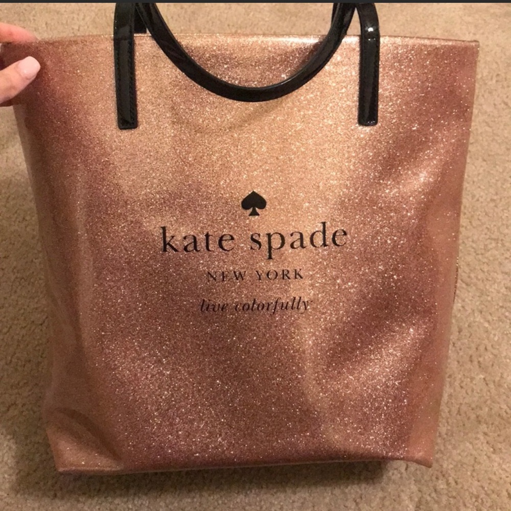 Barely use Kate Spade bag. Glittery rose gold.
